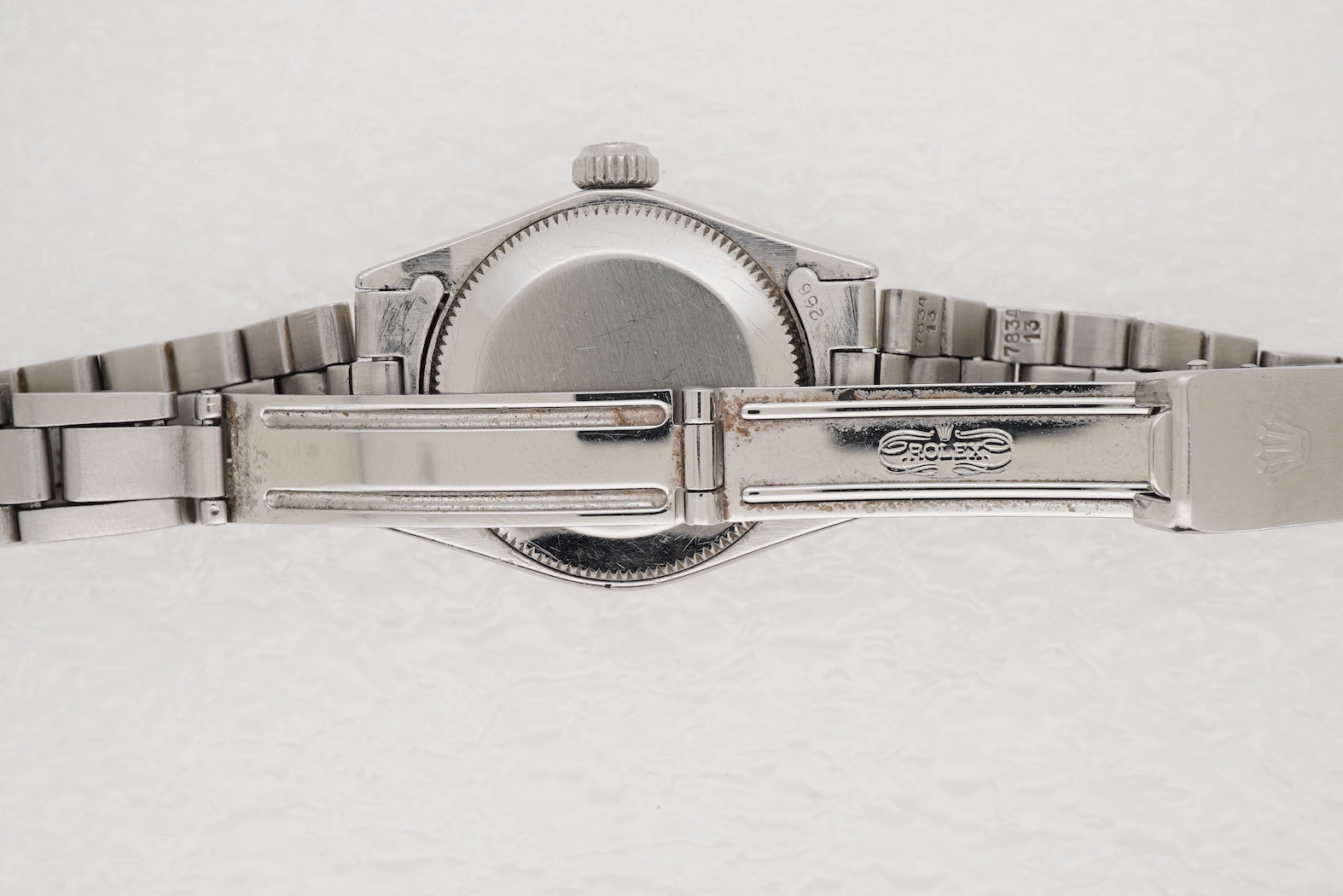 A lady's late 1960's stainless steel Rolex Oyster Perpetual Datejust, with later after market diamond set bezel and mother of pearl dial with diamond dot markers